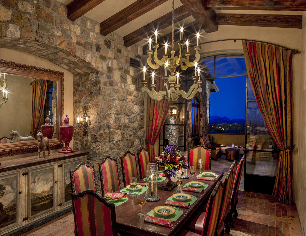 This is an example of a mid-sized separate dining room in Phoenix with beige walls, brick floors and no fireplace.