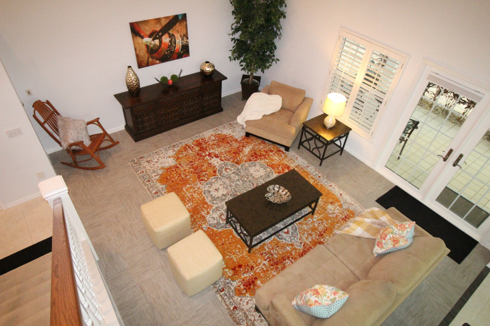 Photo of a transitional living room in Other.