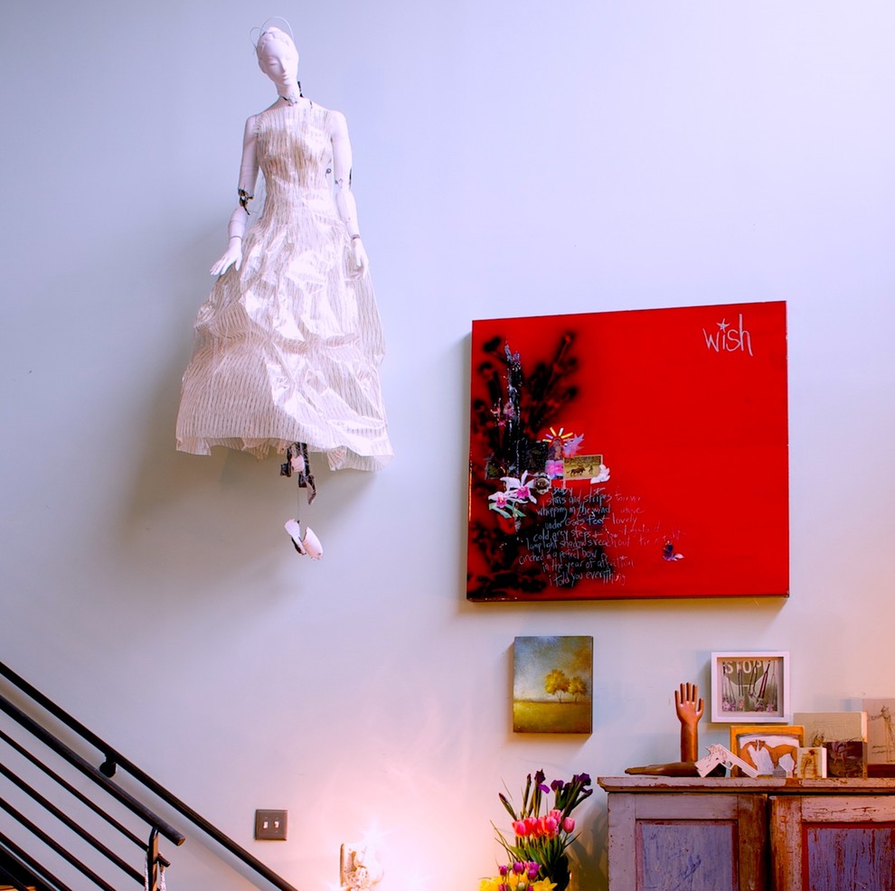 Inspiration for a huge eclectic wooden straight metal railing staircase remodel in Atlanta with metal risers