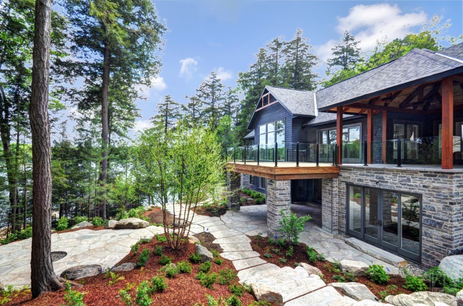 Mid-sized mountain style backyard dock photo in Toronto with no cover