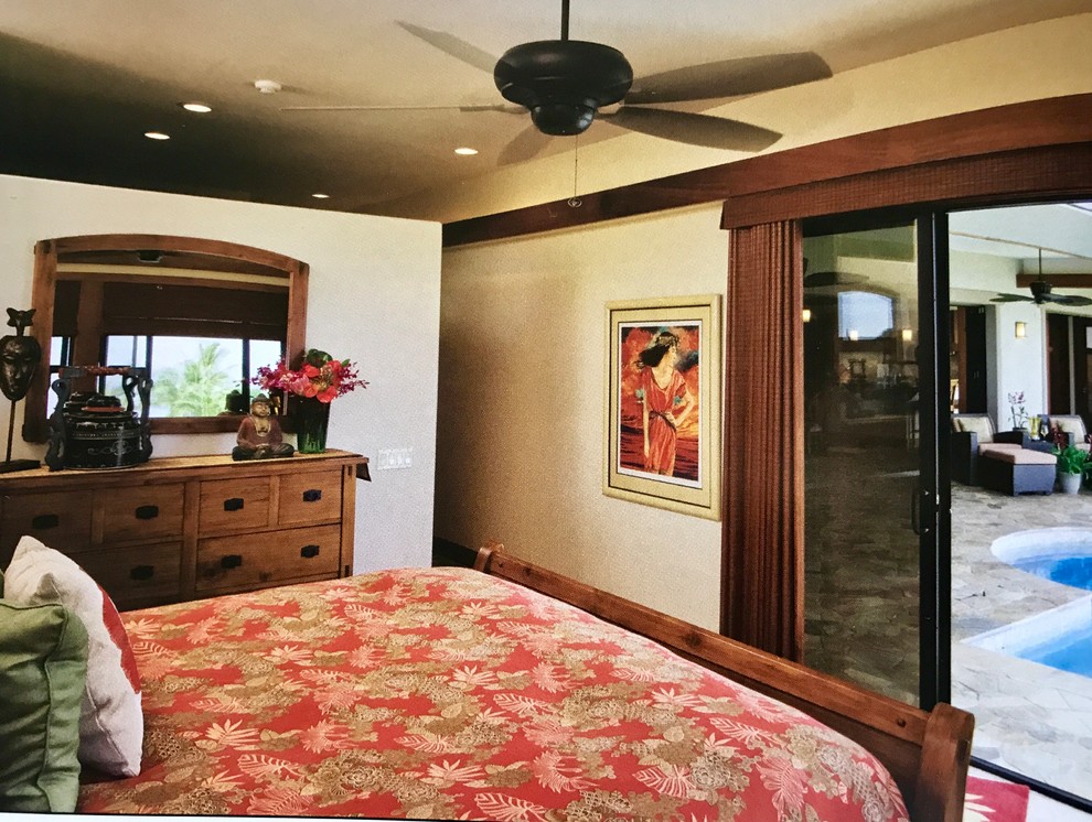 Large transitional master bedroom in Hawaii with white walls, slate floors and multi-coloured floor.