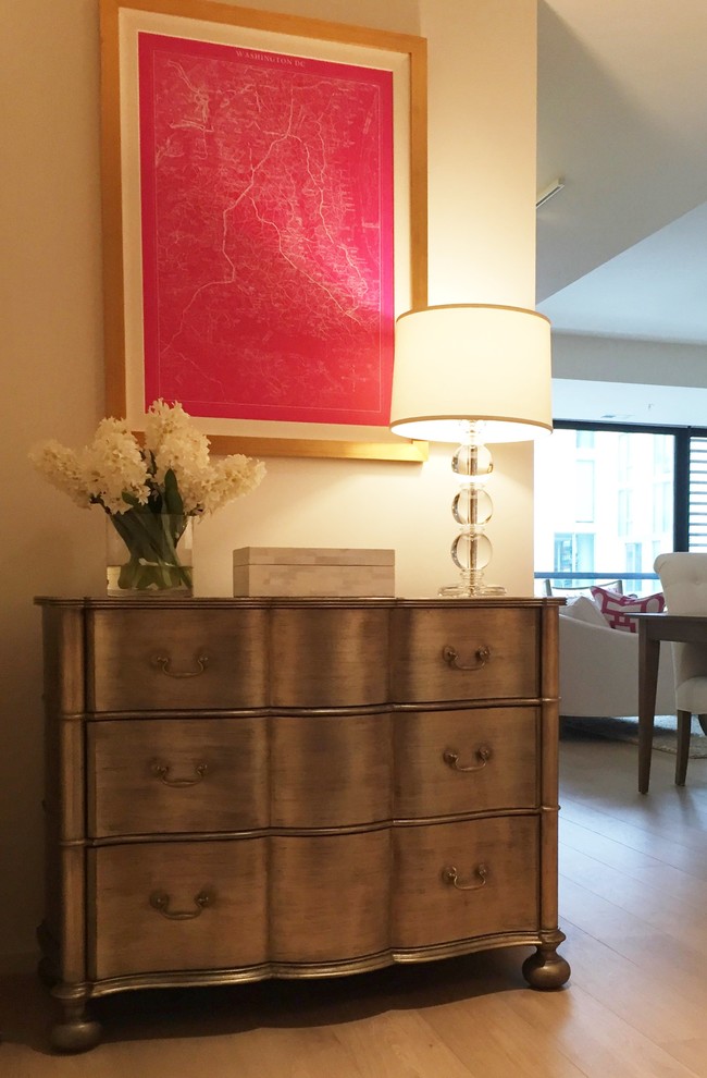 Entryway - transitional light wood floor entryway idea in DC Metro with white walls