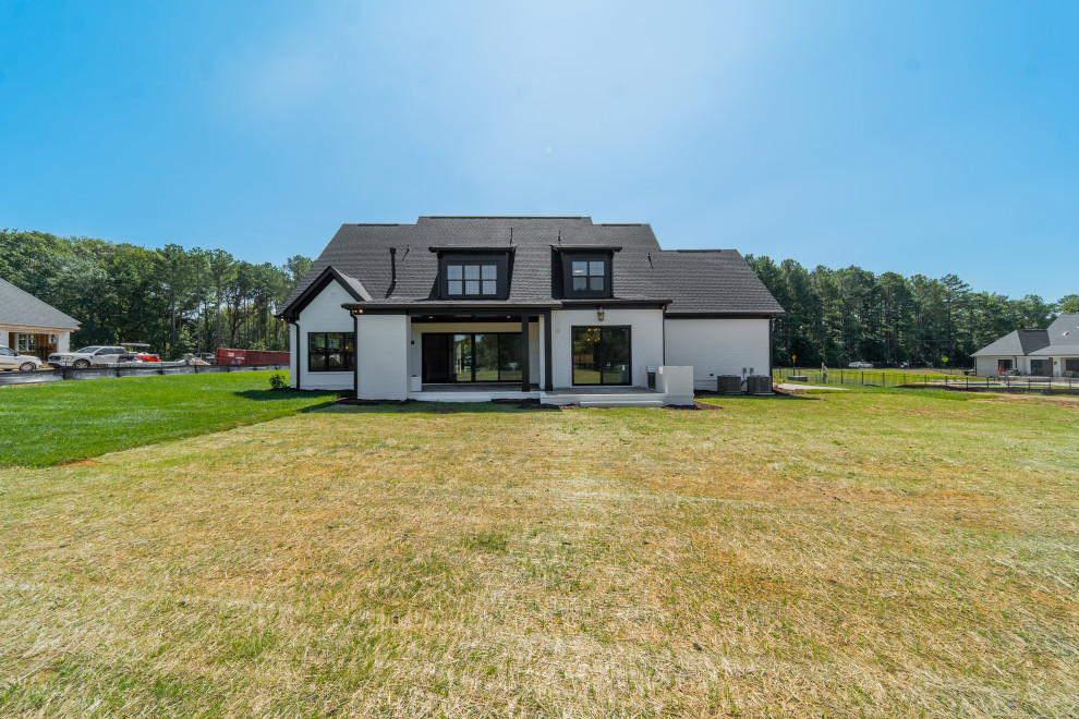 Example of a transitional exterior home design in Charlotte