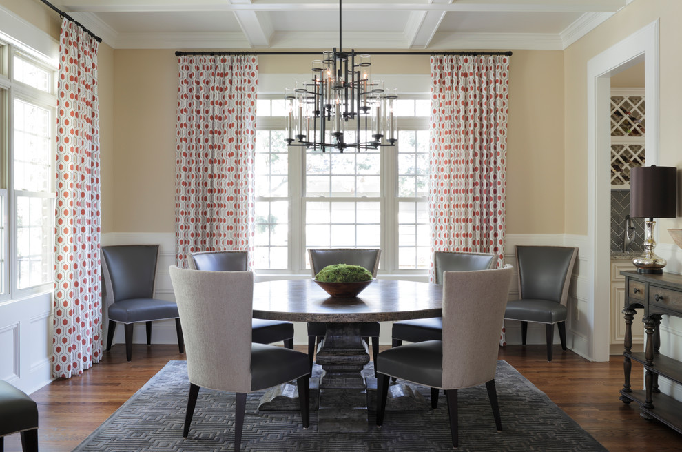 Large transitional dining room in Atlanta with beige walls and medium hardwood floors.