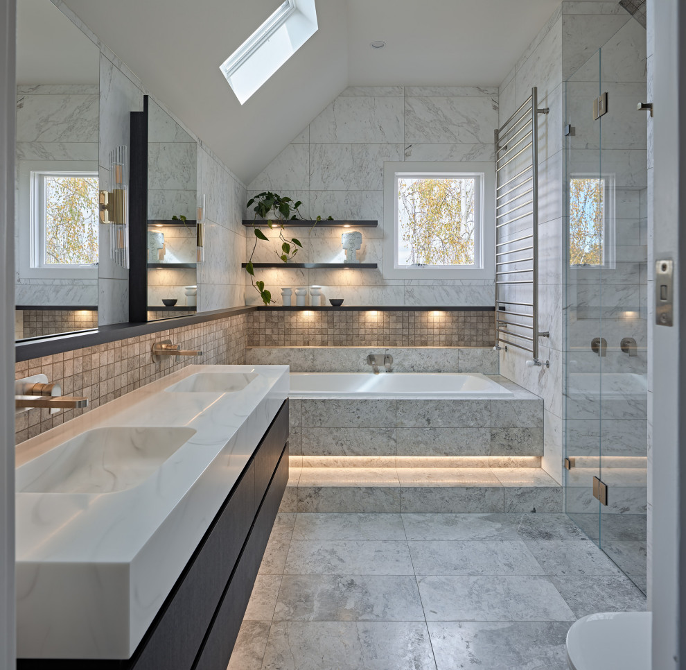 Design ideas for a large contemporary master bathroom in Melbourne with flat-panel cabinets, medium wood cabinets, an alcove tub, mosaic tile, marble floors, solid surface benchtops, white benchtops, a niche, a double vanity and a floating vanity.
