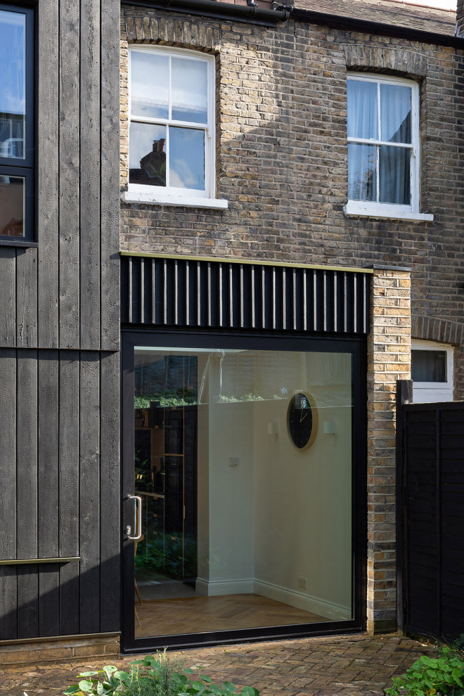 Photo of a contemporary townhouse exterior in London.