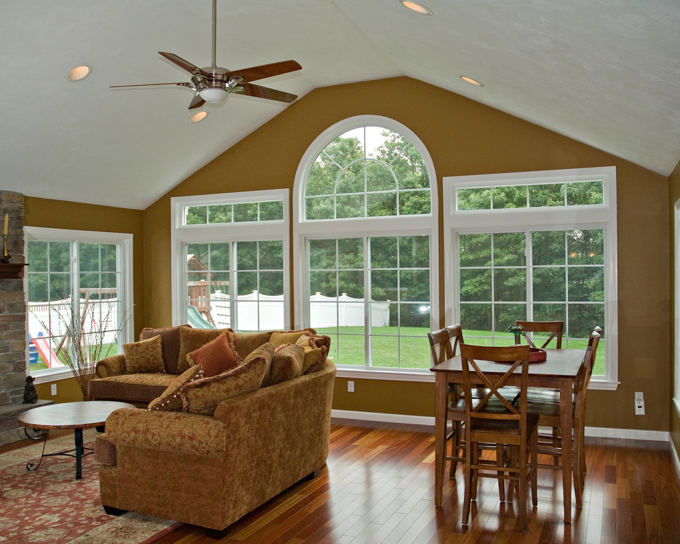This is an example of a traditional family room in Boston.
