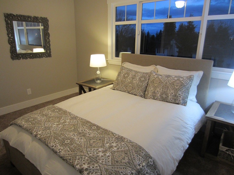 Photo of a small arts and crafts master bedroom in Seattle with carpet.