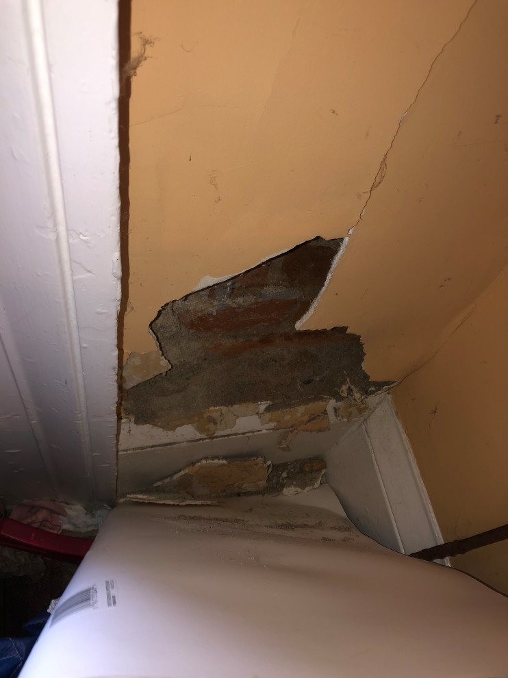 Repairing drywall over brick and plaster