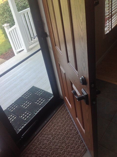 Close Up Of Fiberglass Door And Aluminum Storm Door In A