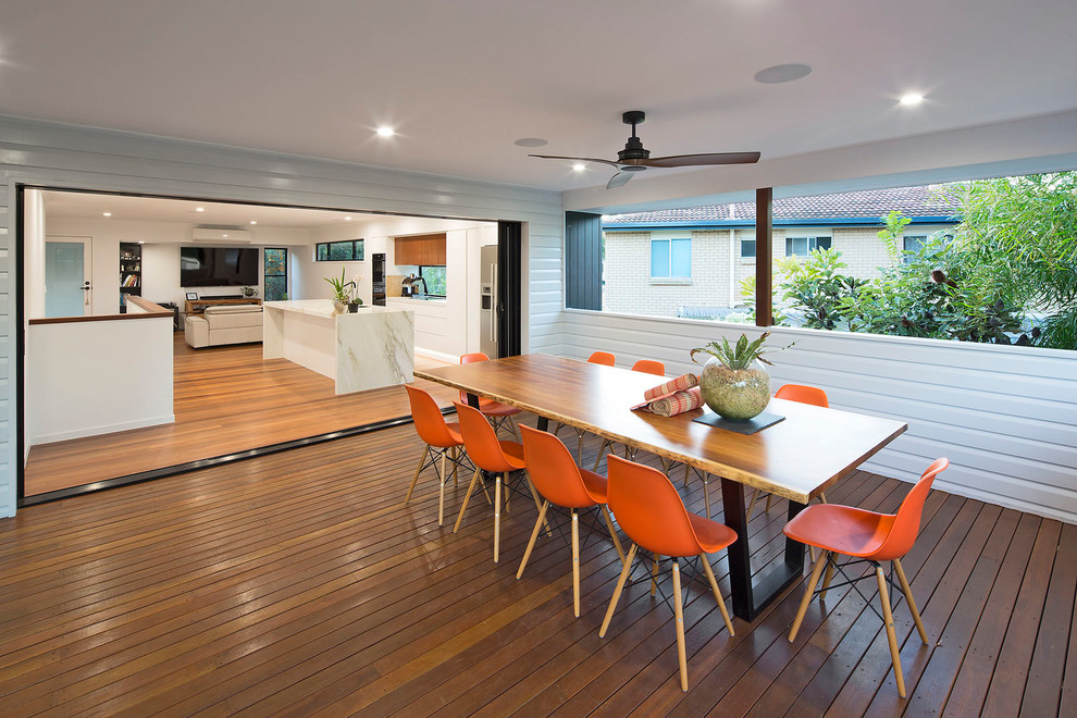 Design ideas for a large contemporary deck in Brisbane with a roof extension.