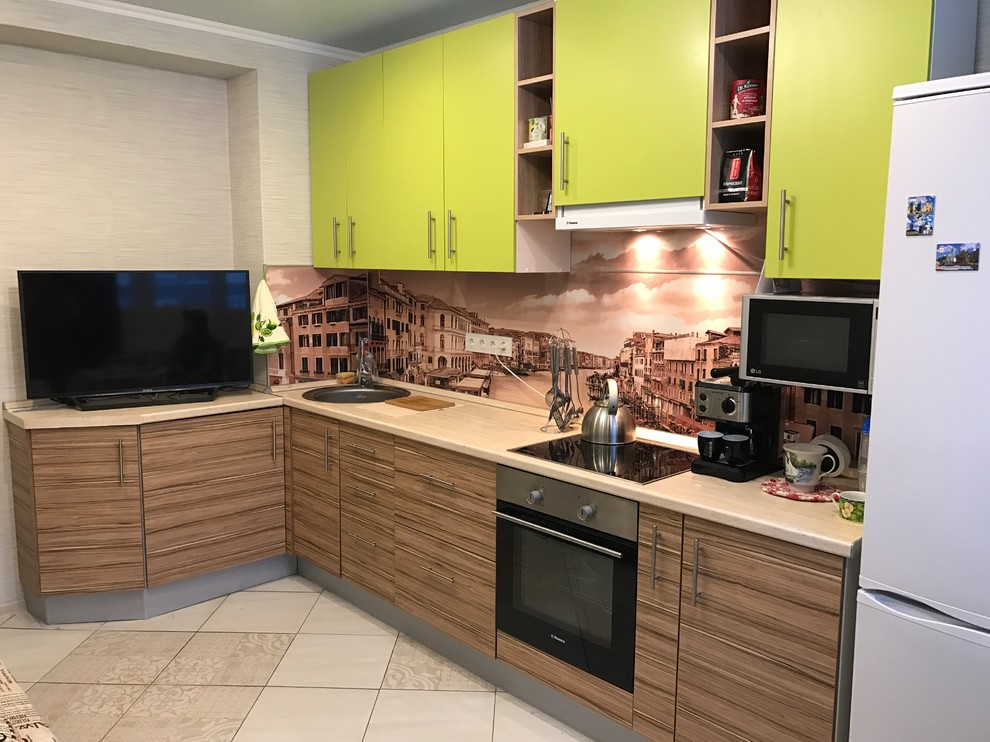 Mid-sized modern l-shaped separate kitchen in Moscow with an undermount sink, open cabinets, light wood cabinets, laminate benchtops, multi-coloured splashback, black appliances, terra-cotta floors and no island.