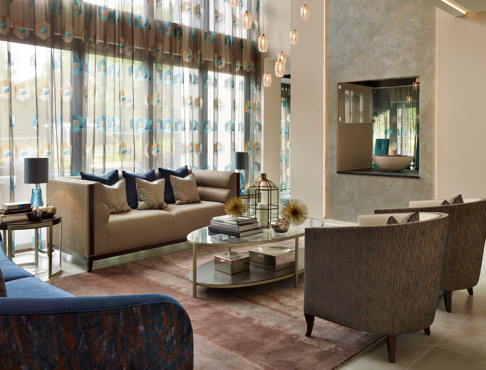 Inspiration for a contemporary formal living room in Berkshire with beige walls, a two-sided fireplace and beige floor.