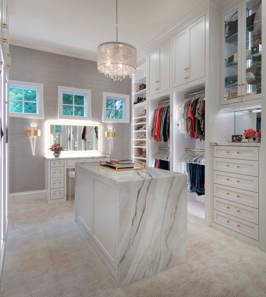 Design ideas for a large transitional gender-neutral walk-in wardrobe in Dallas with beaded inset cabinets, white cabinets, carpet and beige floor.