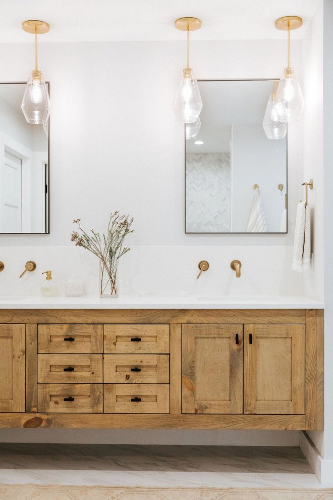 Inspiration for a transitional bathroom in Portland Maine with shaker cabinets, medium wood cabinets, grey walls, an undermount sink and white benchtops.
