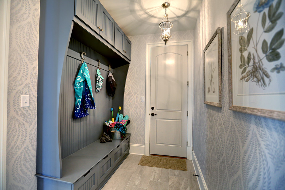 Photo of a transitional mudroom in Richmond with blue walls.