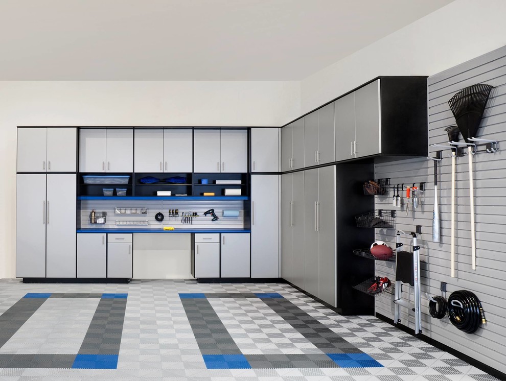 Inspiration for a large contemporary attached two-car garage remodel in Louisville