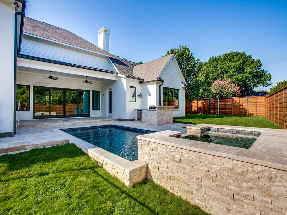 Inspiration for a transitional two-story pool remodel in Dallas