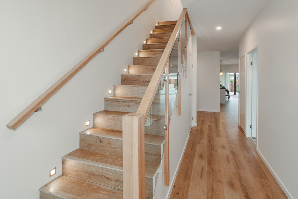 Design ideas for a mid-sized beach style staircase in Sunshine Coast.