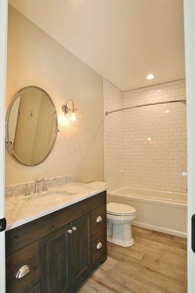 Transitional bathroom photo with flat-panel cabinets and white cabinets