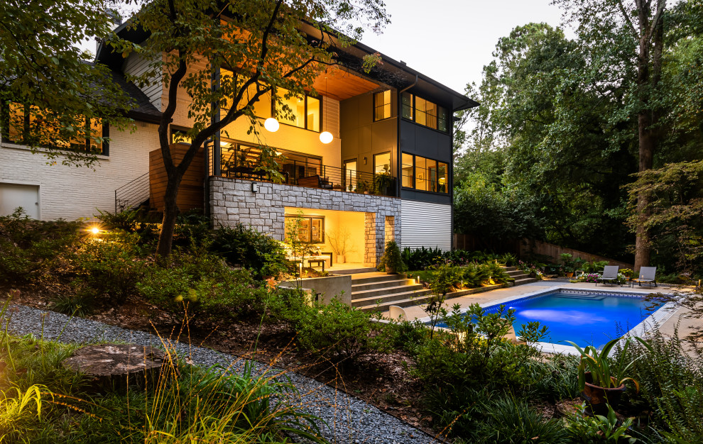 This is an example of a midcentury exterior in Atlanta.