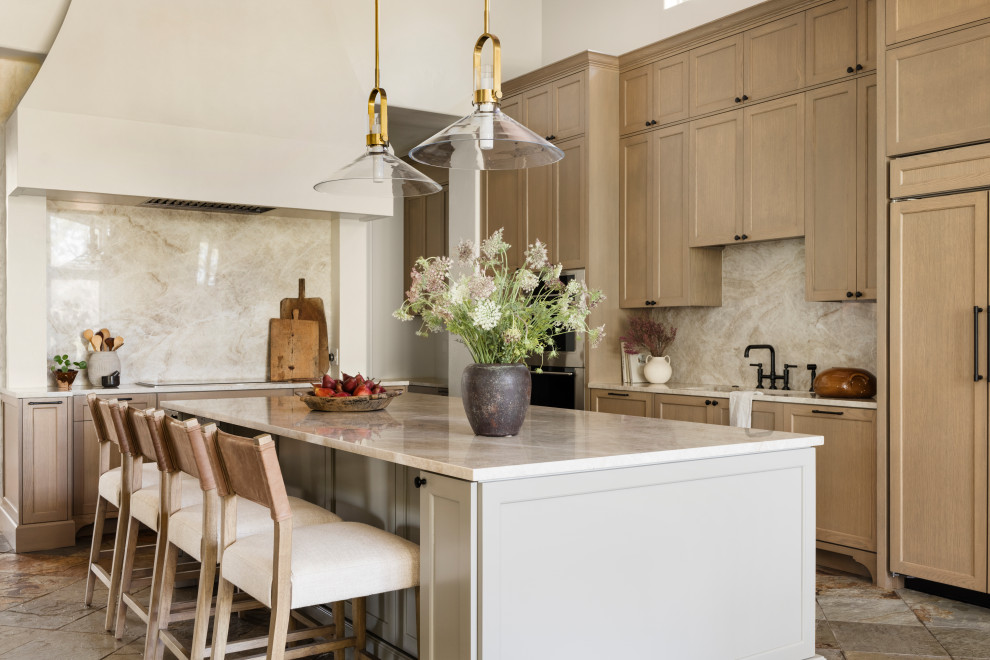 Example of a tuscan kitchen design in Austin