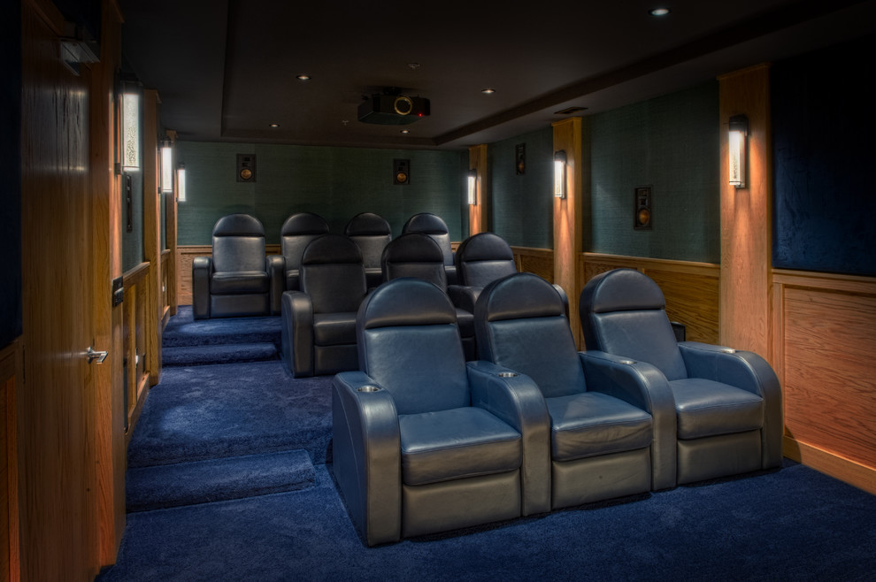 Design ideas for a large traditional enclosed home theatre in Other with blue walls, carpet, a projector screen and blue floor.