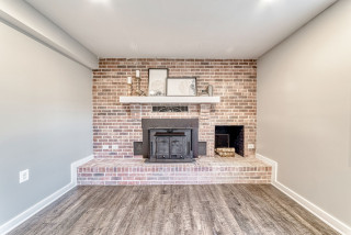 75 Vinyl Floor Basement with a Wood Stove Ideas You'll Love - September,  2023 | Houzz