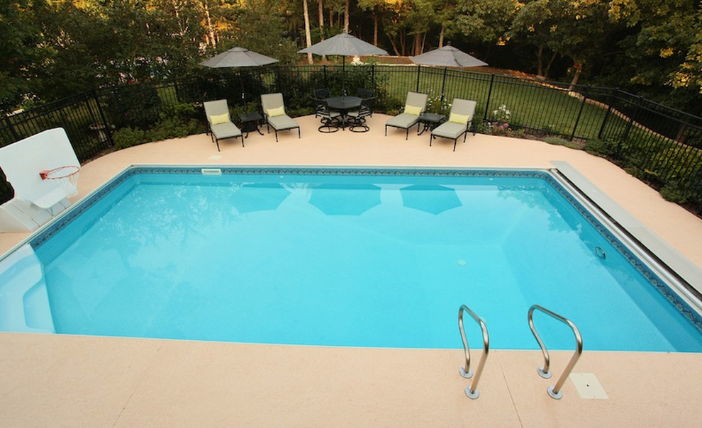 Inspiration for a mid-sized backyard rectangular lap pool remodel