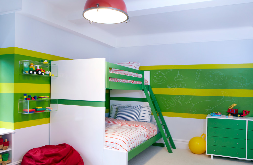 Large eclectic kids' bedroom in New York with carpet and multi-coloured walls for kids 4-10 years old and boys.