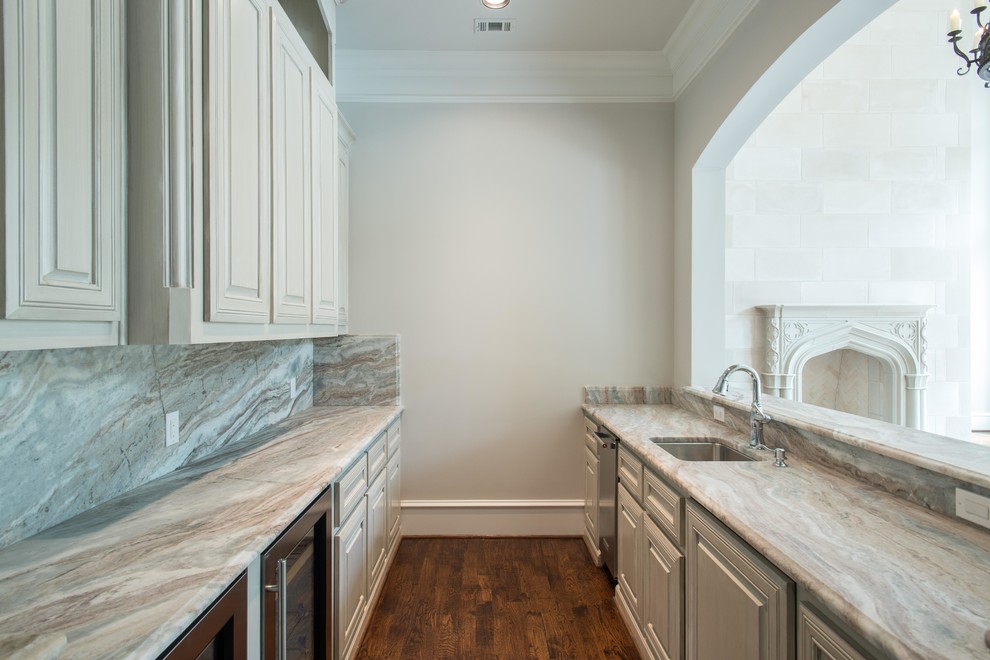 Fantasy Brown marble bar Traditional Home Bar Dallas by