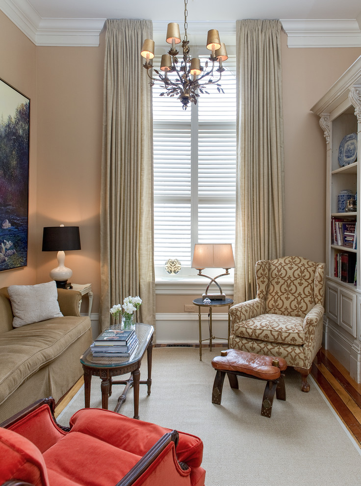 This is an example of a small traditional living room in Toronto with beige walls.