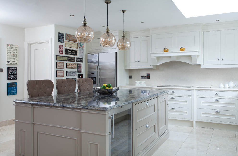 Inspiration for a mid-sized transitional single-wall kitchen in Dublin with granite benchtops, with island, beige floor, grey benchtop, beaded inset cabinets, beige cabinets and stainless steel appliances.