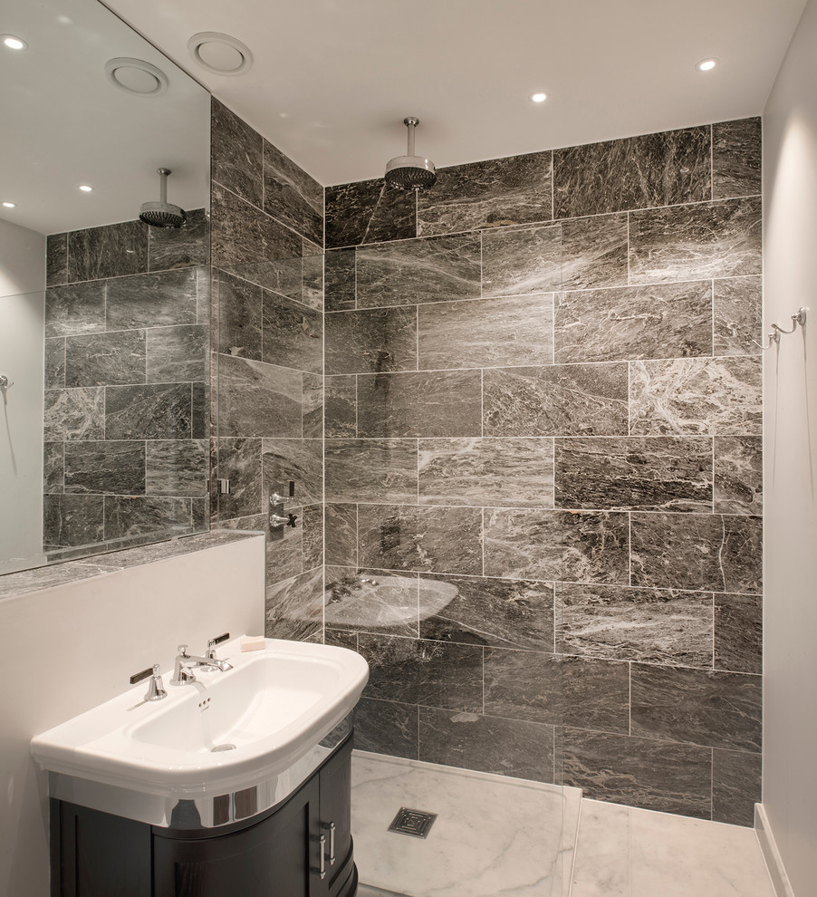 Inspiration for a contemporary bathroom in London with shaker cabinets, dark wood cabinets, an open shower, gray tile, grey walls, marble floors and an open shower.