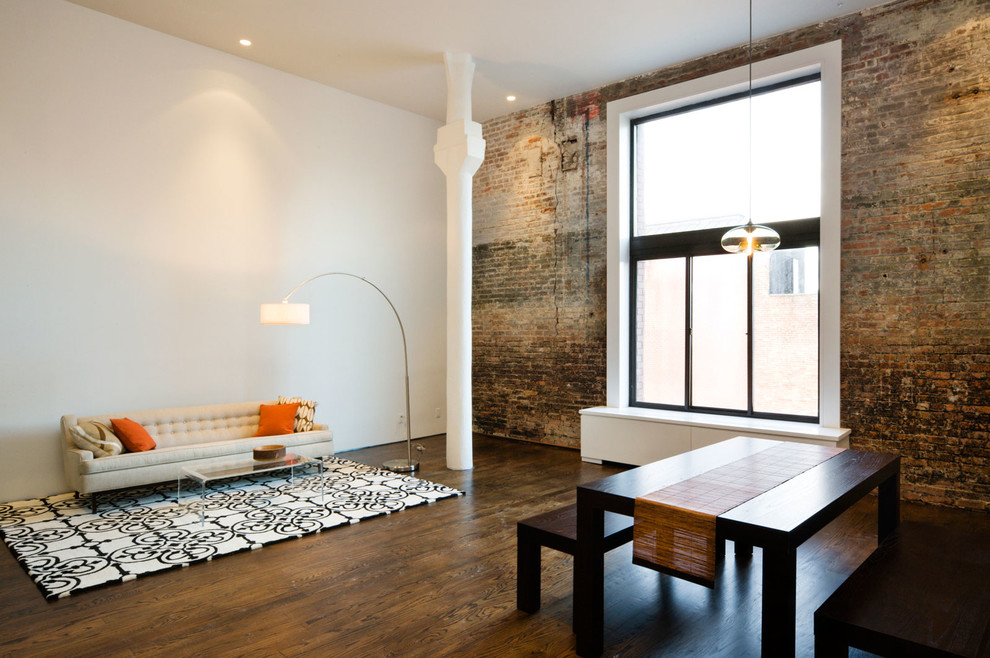 Large urban formal and open concept dark wood floor and brown floor living room photo in New York with white walls, no fireplace and no tv