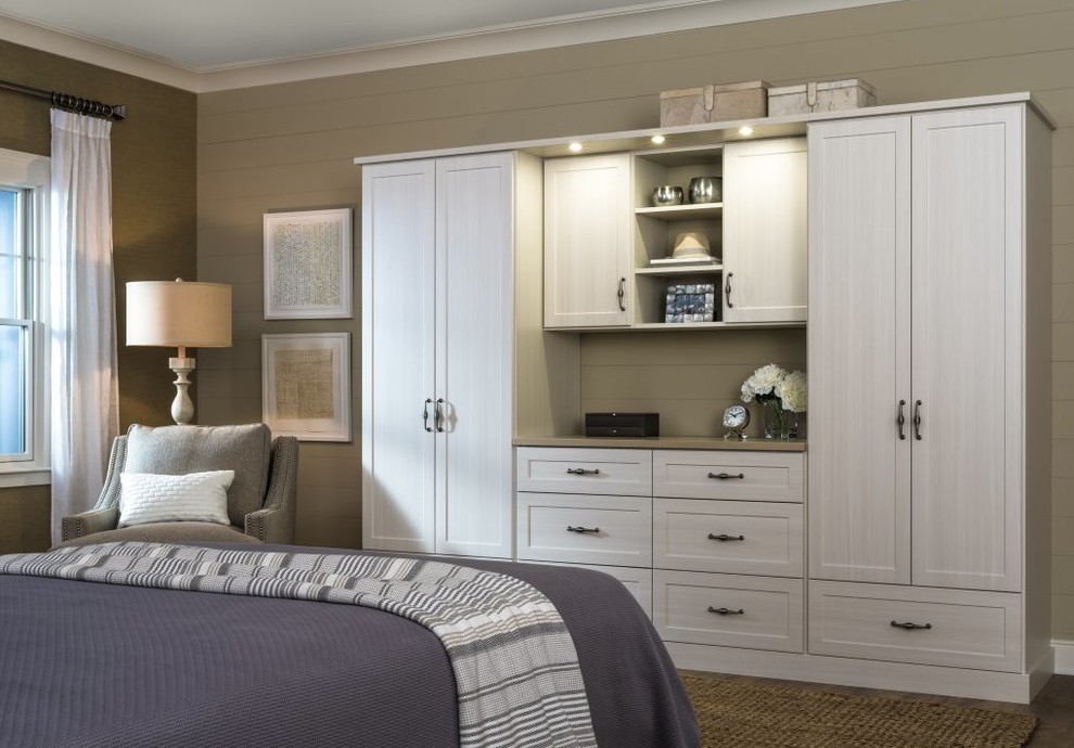 Inspiration for a mid-sized transitional master bedroom in Other with beige walls and dark hardwood floors.