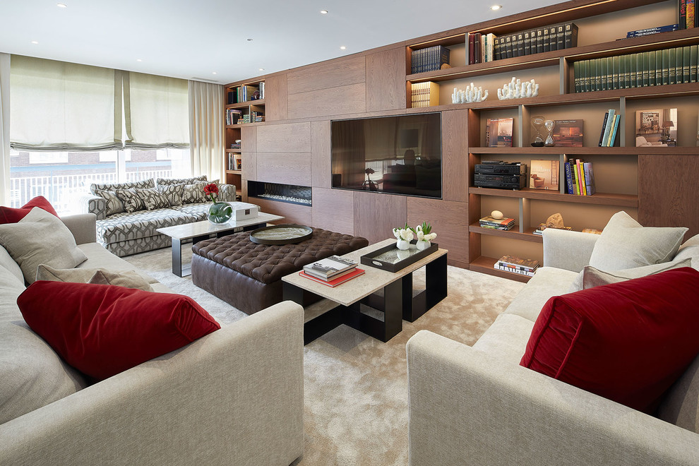 Photo of a contemporary formal enclosed living room in Barcelona with brown walls, carpet, a ribbon fireplace, a wood fireplace surround, a built-in media wall and beige floor.