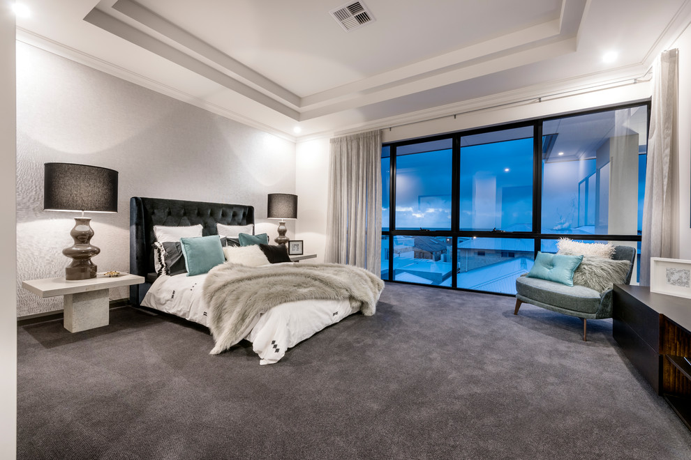 Photo of a contemporary bedroom in Perth with white walls, carpet and grey floor.