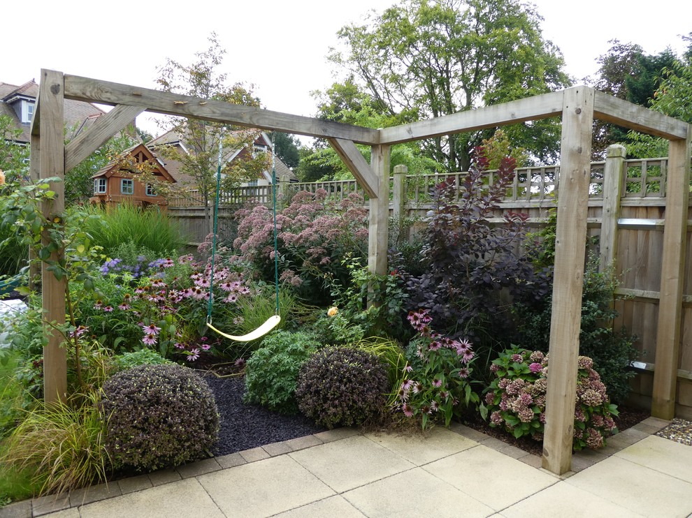 Inspiration for a small traditional backyard garden in Cheshire.