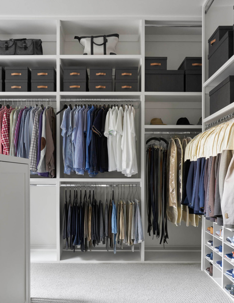 This is an example of a transitional storage and wardrobe in Dallas.