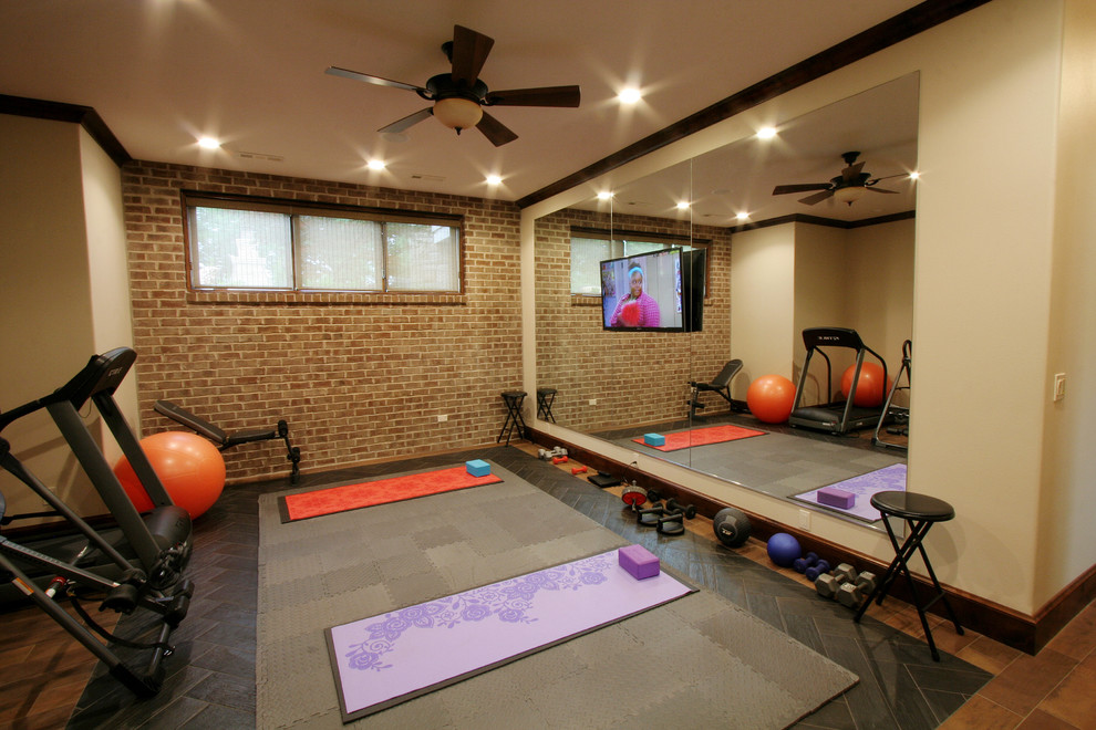Design ideas for a traditional home yoga studio in Kansas City with beige walls and ceramic floors.