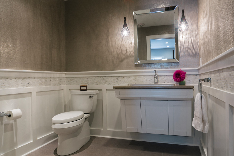 Traditional bathroom in Providence with shaker cabinets, white cabinets, white tile, marble, porcelain floors, engineered quartz benchtops and beige floor.