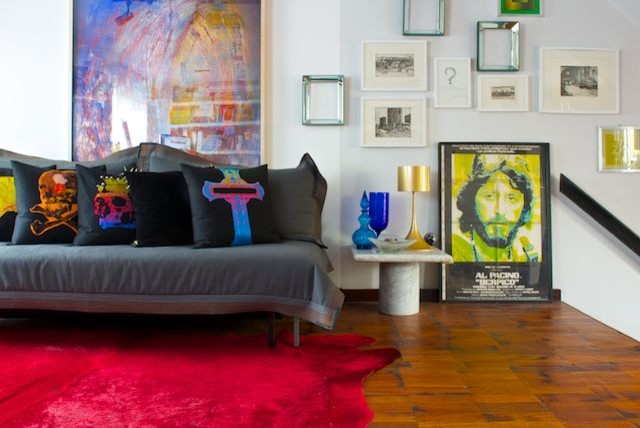 Design ideas for a small bohemian open plan living room in London with white walls, medium hardwood flooring, no fireplace and a built-in media unit.