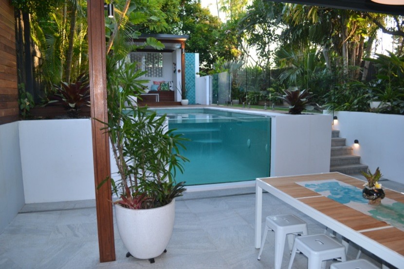 Mid-sized contemporary pool in Brisbane.