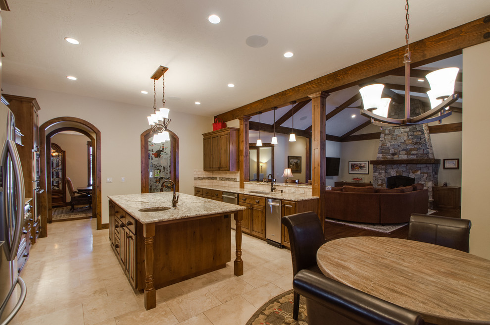 Inspiration for a rustic kitchen remodel with stainless steel appliances