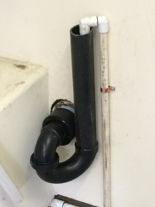 Plumbing softener drain line to sewer clean out