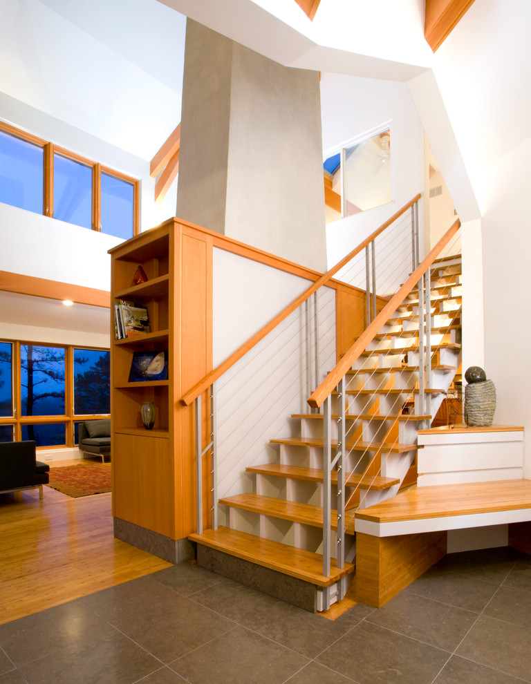Inspiration for a large contemporary wood staircase in Boston.