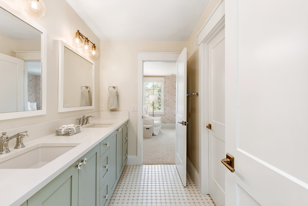 Example of a transitional bathroom design in Denver