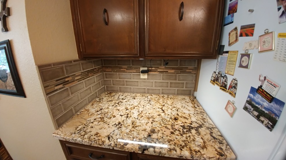 Kitchen - kitchen idea in Seattle with subway tile backsplash