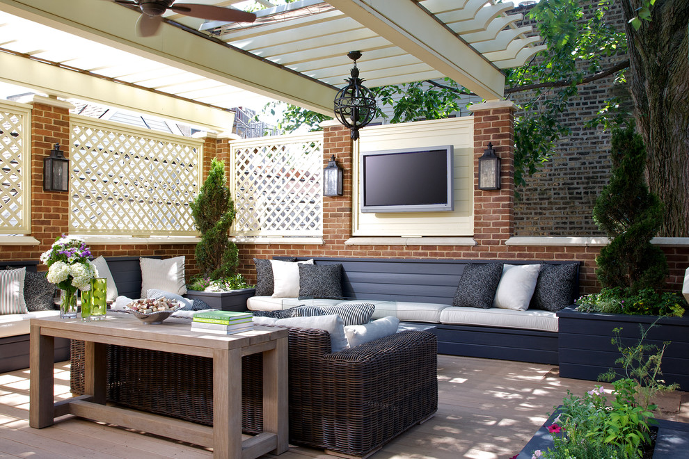 Photo of an expansive traditional rooftop and rooftop deck in Chicago with a pergola and a container garden.